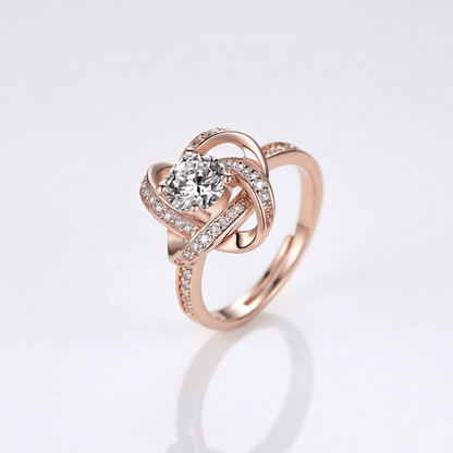 ROSE GOLD ZIRCONIA TWISTED KNOT RING - (ADJUSTABLE) by Harrison & James - ring product image 1