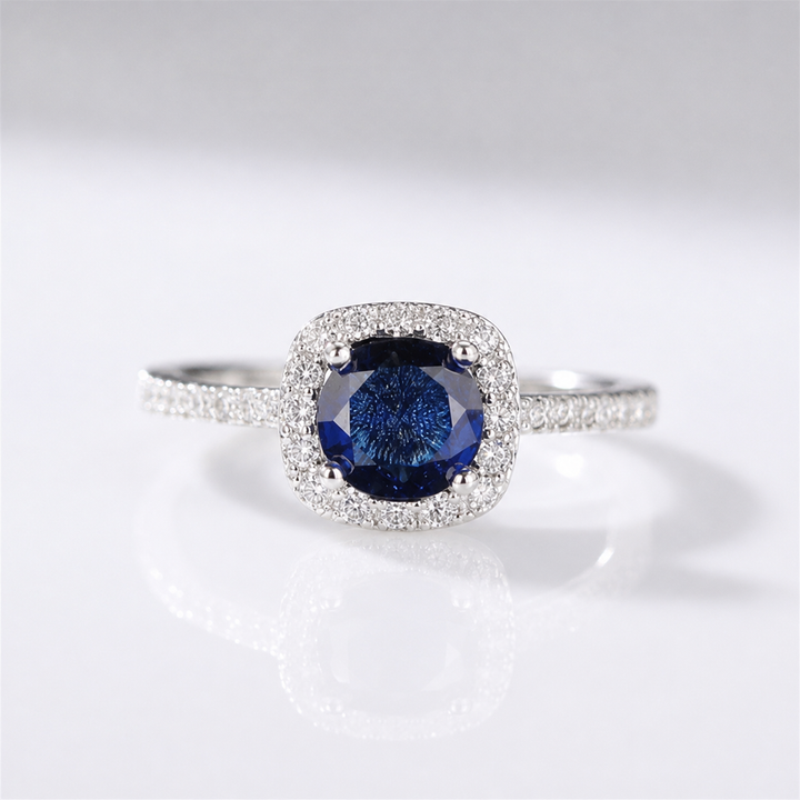 BLUE SAPPHIRE CUSHION HALO RING by Harrison & James - ring product image 1