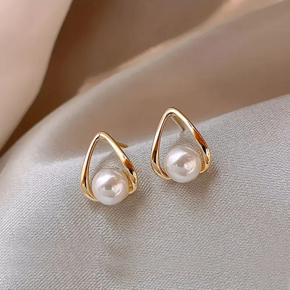 Elegantr Hollow Triangle Pearl Earrings by Harrison & James - earrings product image 1